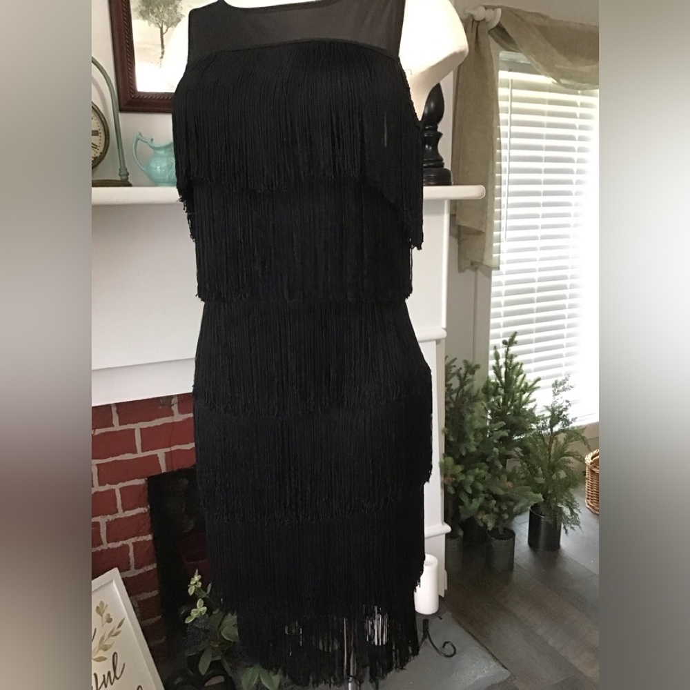 flapper dress, black stretch knit. Body contouring.